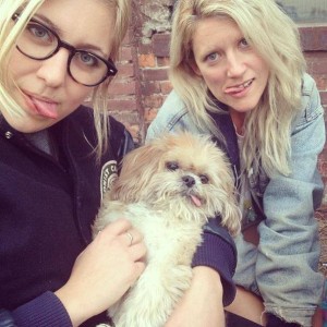 Jasamine White-Gluz and Laura Lloyd of No Joy stick out their tongues like their little dog