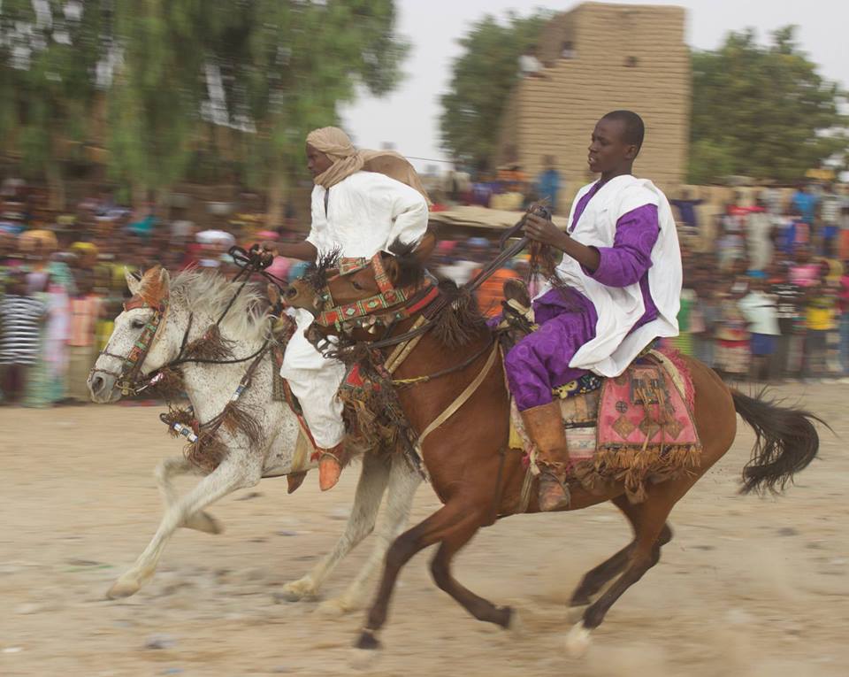 Riders at a Malian cultural festival.